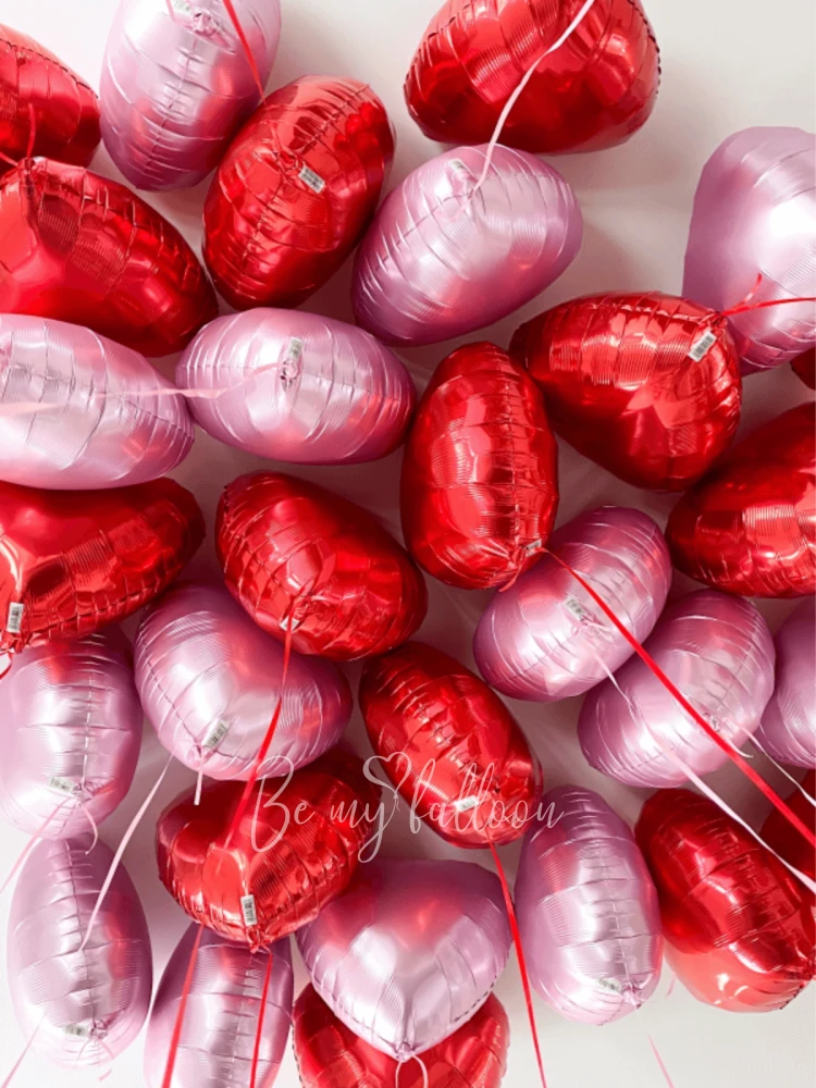 Balloons under the ceiling "Love will save the world"